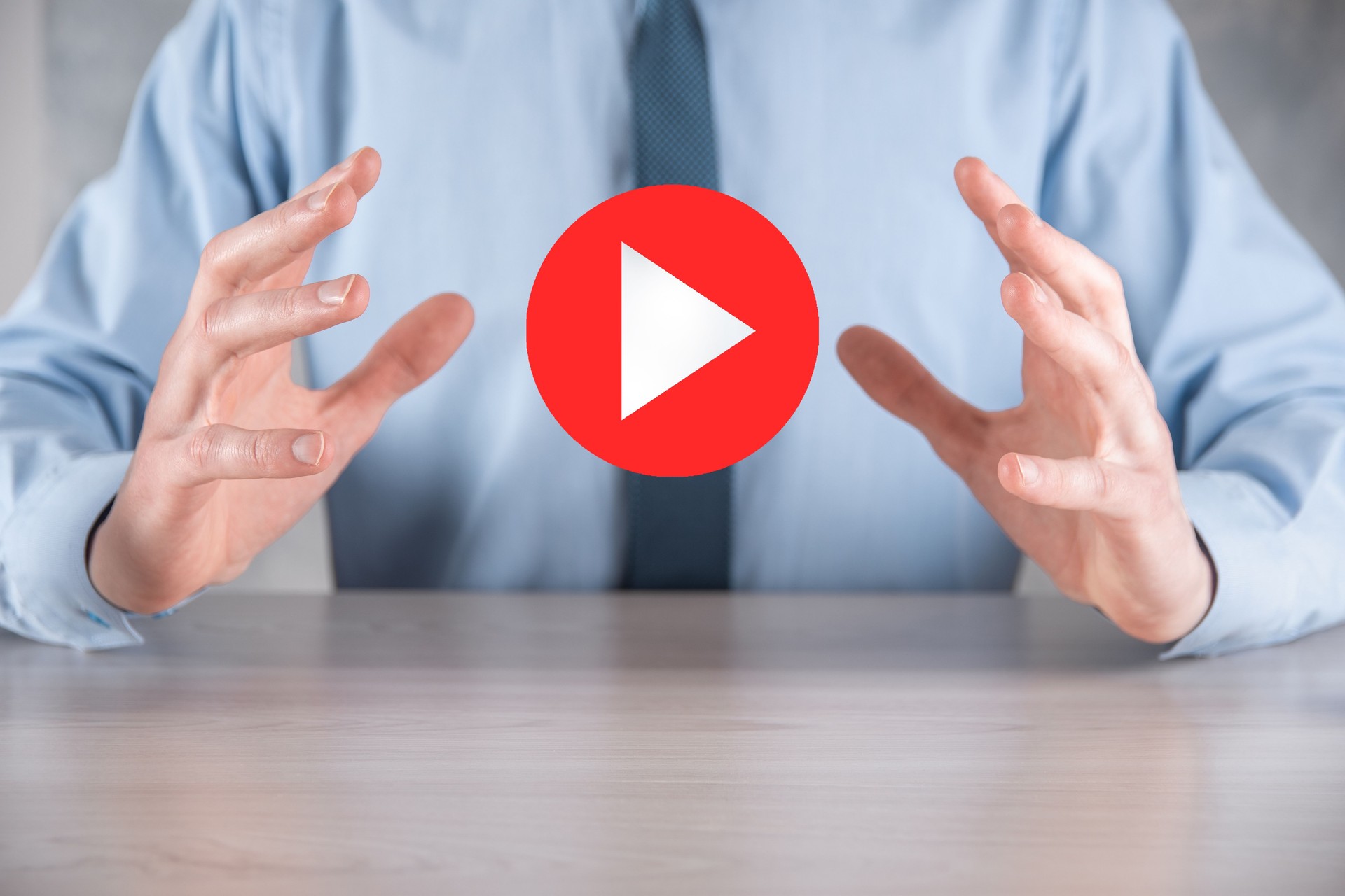 Businessman pressing, hold play button sign to start or initiate projects.Video Play Presentation. Idea for business, technology.media player button. Play icon.Go.